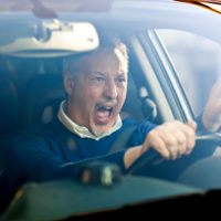 Angry man driving